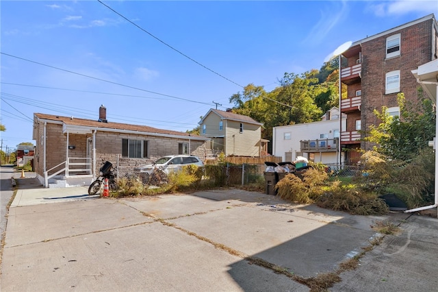 rear view of house with a balcony