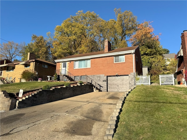 view of front facade with a front lawn and a garage