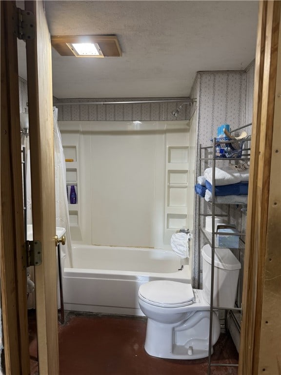 bathroom with toilet and shower / washtub combination