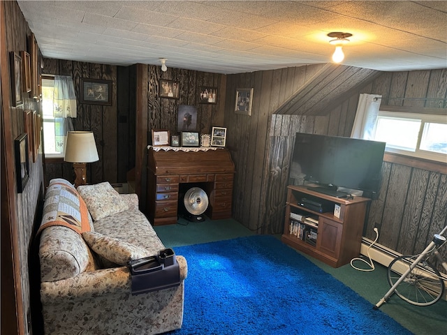 living room with wood walls and carpet