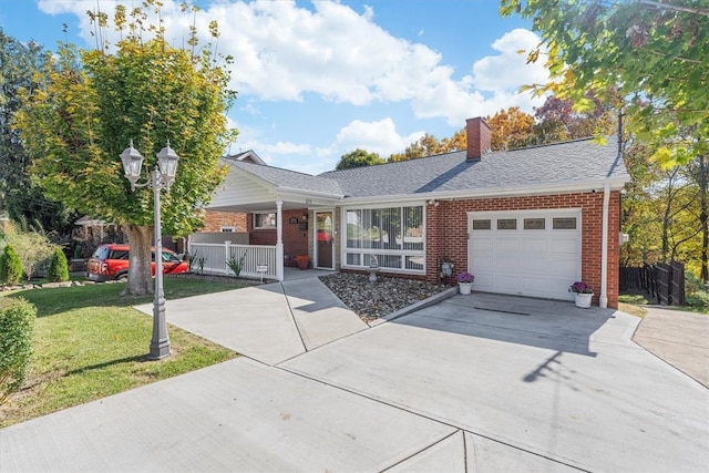 ranch-style house with a front yard and a garage