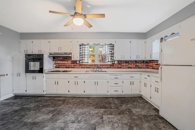 kitchen featuring white cabinets, decorative backsplash, sink, and black appliances