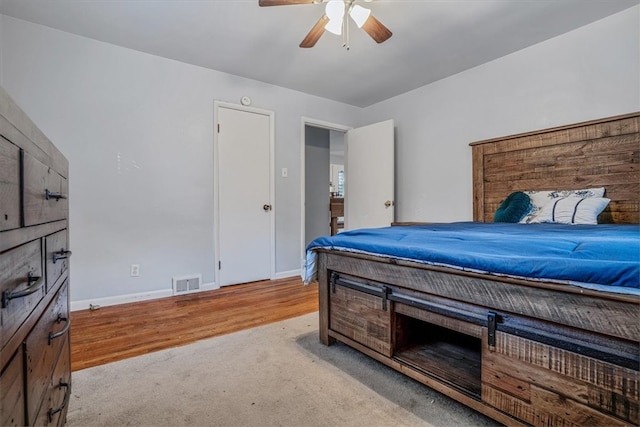 bedroom featuring ceiling fan and light wood-type flooring