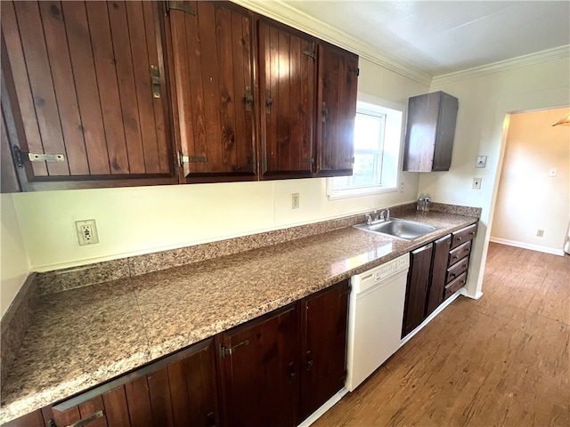 kitchen with white dishwasher, sink, crown molding, dark brown cabinetry, and dark hardwood / wood-style flooring