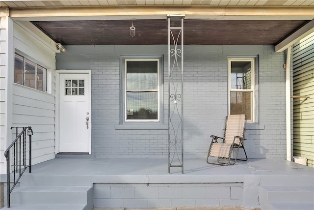 entrance to property with covered porch