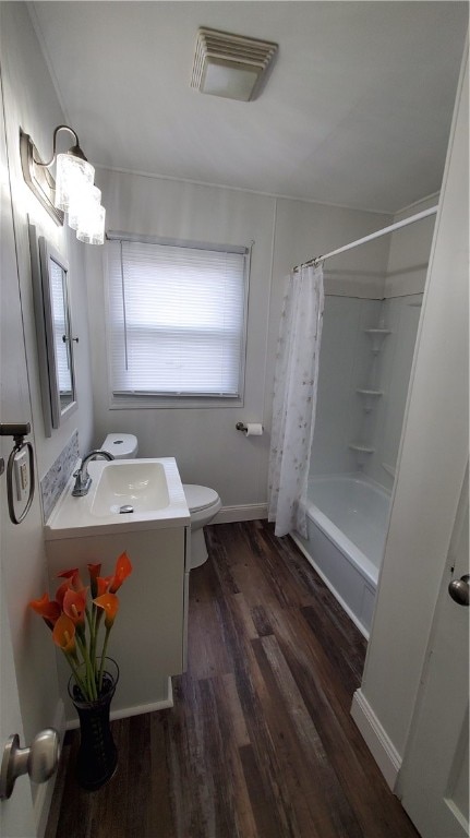 full bathroom with toilet, vanity, shower / bath combo, and hardwood / wood-style flooring