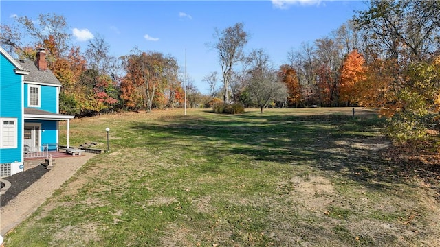 view of yard featuring a porch