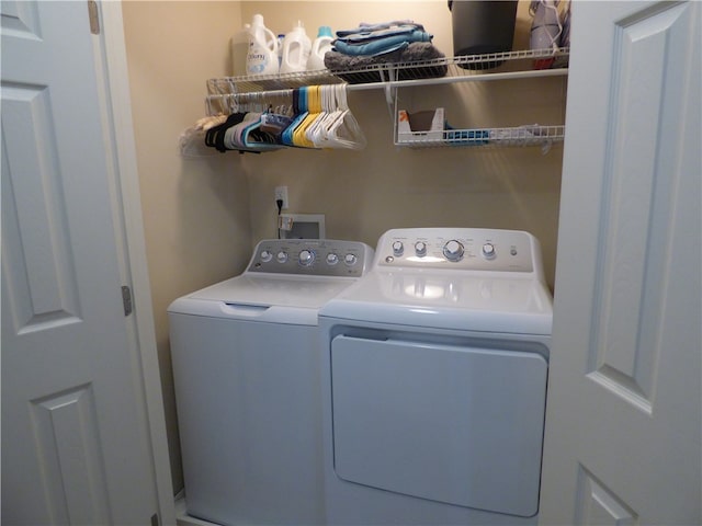 laundry area featuring washing machine and dryer