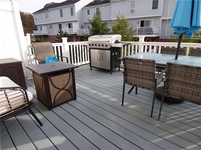 wooden deck with area for grilling