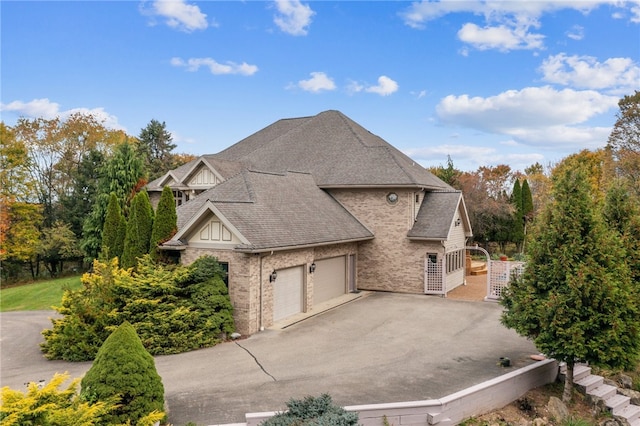 view of side of property featuring a garage