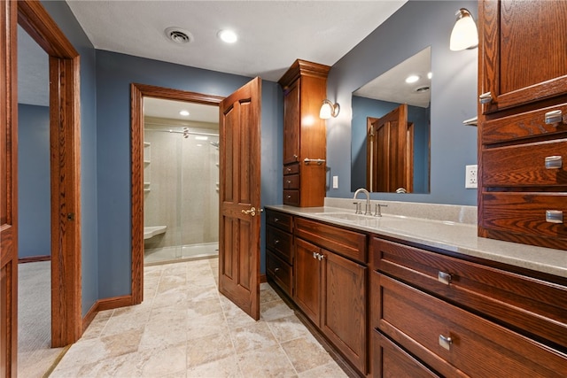 bathroom with vanity and walk in shower