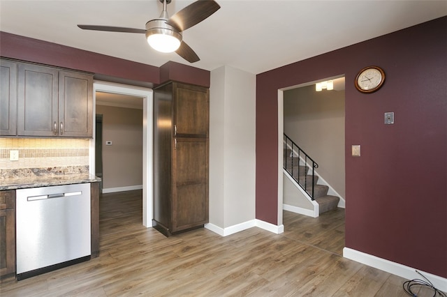 kitchen with tasteful backsplash, dark brown cabinets, light hardwood / wood-style flooring, dishwasher, and light stone counters