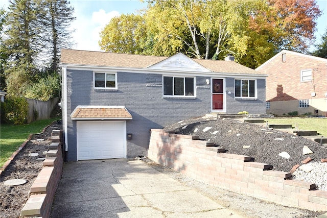 view of front of property featuring a garage