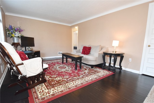 living room featuring dark hardwood / wood-style flooring