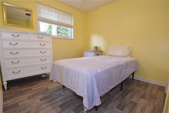 bedroom featuring dark hardwood / wood-style floors