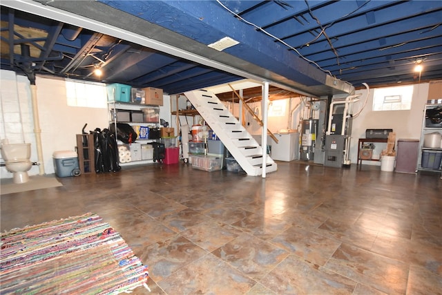 basement featuring heating unit and gas water heater