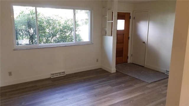 entrance foyer with hardwood / wood-style floors