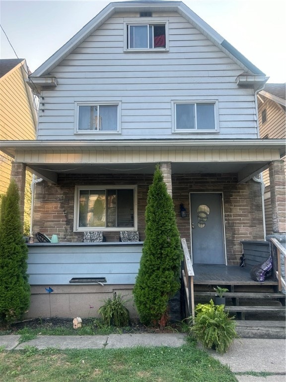 view of front of home featuring covered porch