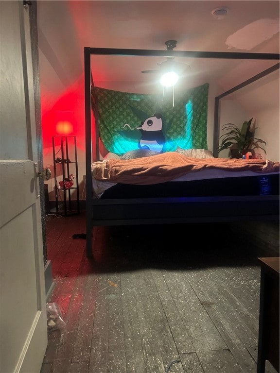 bedroom featuring wood-type flooring and ceiling fan