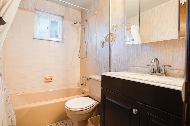 full bathroom featuring vanity, shower / bath combo, and toilet