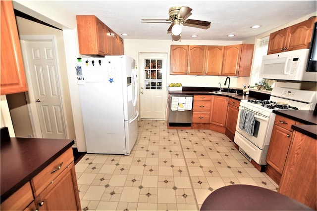 kitchen with ceiling fan, white appliances, and sink