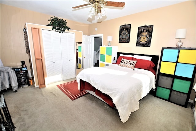 carpeted bedroom with ceiling fan