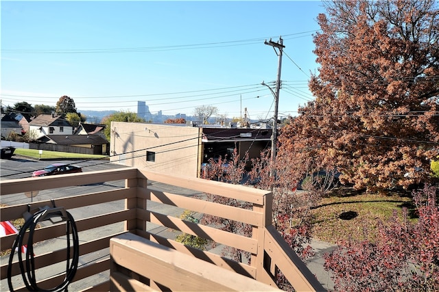 view of yard with a balcony