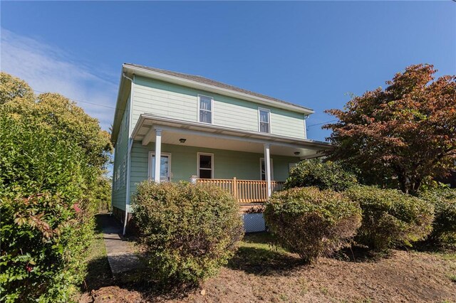 205 Woodlawn Ave, Connellsville, PA 15425 - view of front of property featuring covered porch