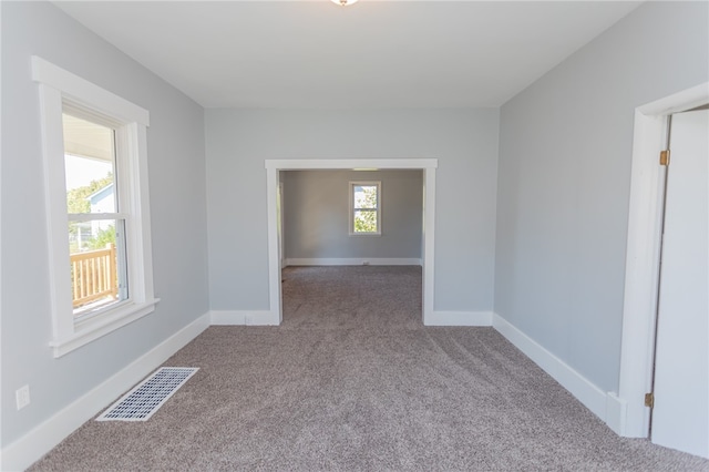 empty room with light carpet