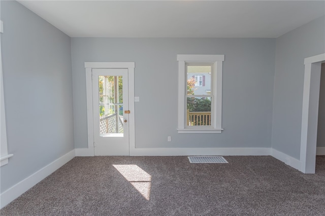 view of carpeted spare room