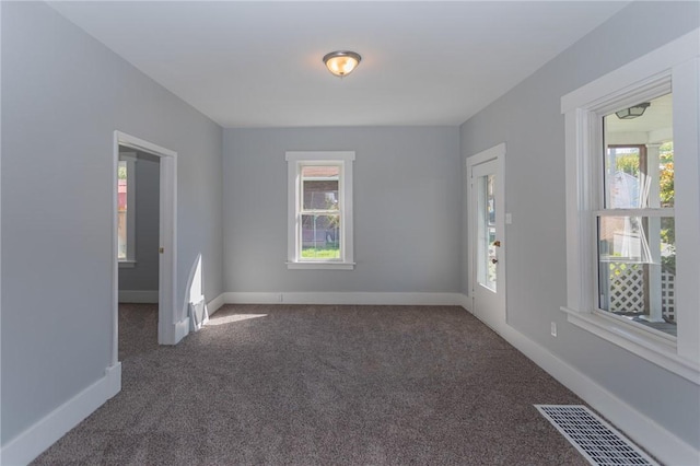 205 Woodlawn Ave, Connellsville, PA 15425 - carpeted spare room with plenty of natural light and baseboards