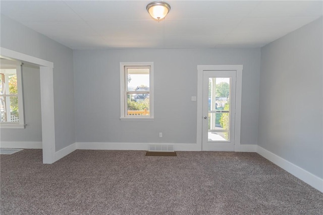 205 Woodlawn Ave, Connellsville, PA 15425 - carpeted spare room featuring baseboards