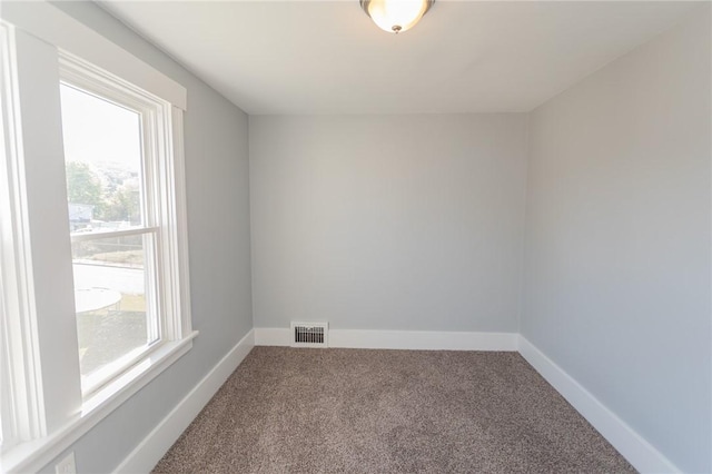 205 Woodlawn Ave, Connellsville, PA 15425 - carpeted empty room featuring baseboards