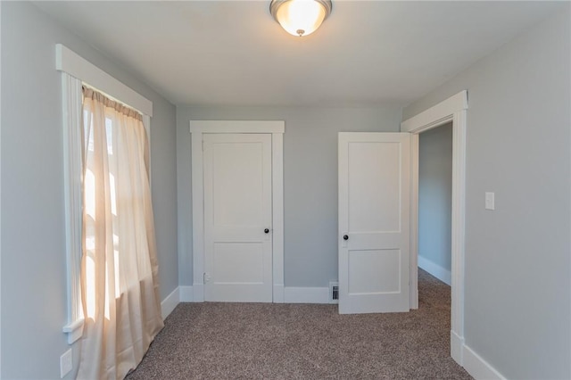 205 Woodlawn Ave, Connellsville, PA 15425 - unfurnished bedroom with carpet, a closet, and baseboards