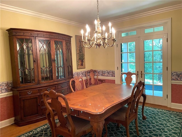 1197 Bankson Rd, Pa, PA 16301 - dining space featuring french doors, light wood-type flooring, baseboards, a chandelier, and ornamental molding