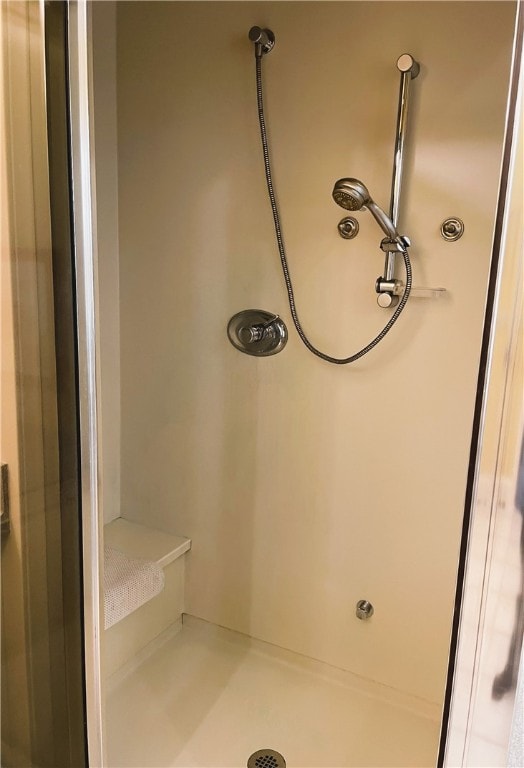 bathroom featuring walk in shower