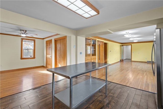 game room featuring ornamental molding, hardwood / wood-style floors, and ceiling fan