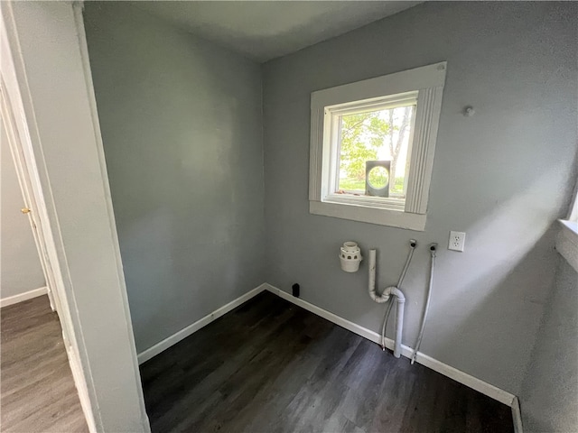 laundry area featuring hookup for a washing machine and hardwood / wood-style floors