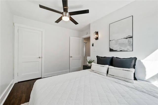 bedroom with wood-type flooring and ceiling fan