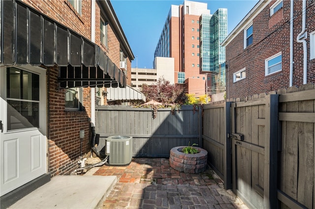 view of patio featuring cooling unit