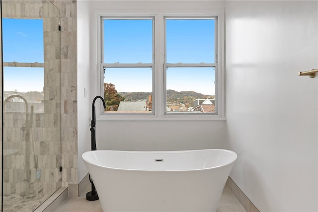 bathroom with plus walk in shower and tile patterned floors