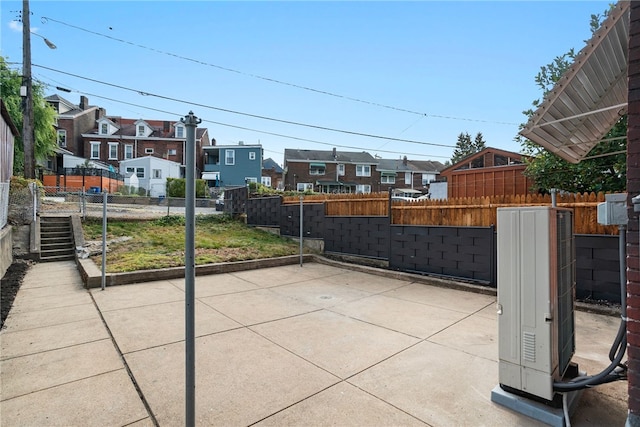 view of patio / terrace with central AC unit