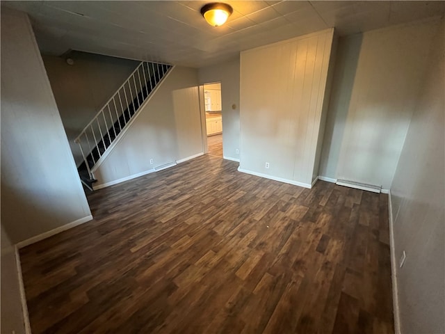 empty room with dark hardwood / wood-style floors