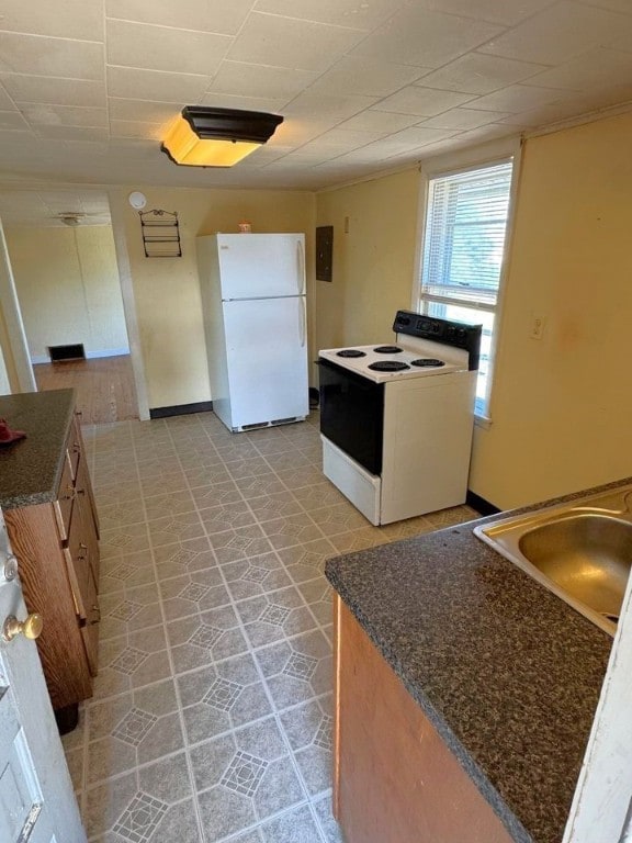 1200 Philadelphia St, Indiana Boro Ind, PA 15701 - kitchen featuring white appliances, light tile patterned floors, and sink