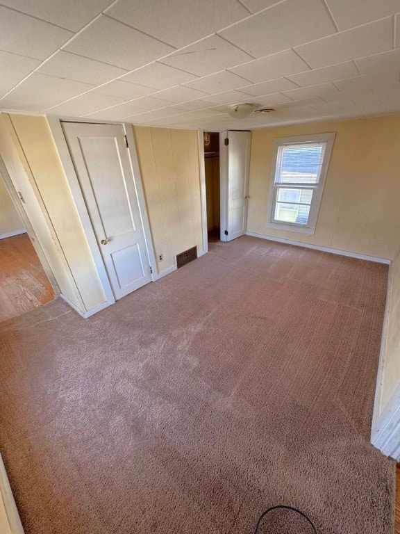 unfurnished bedroom with carpet