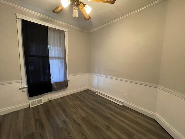 empty room featuring dark wood-type flooring, crown molding, and ceiling fan