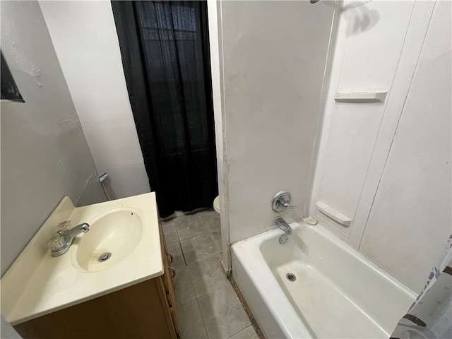 full bathroom with vanity, toilet, tile patterned floors, and shower / tub combo