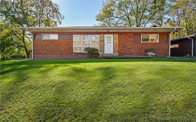view of front of home with a front yard