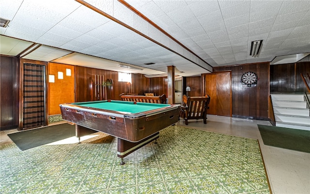 game room featuring wooden walls and pool table