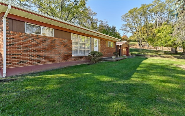 view of home's exterior with a yard